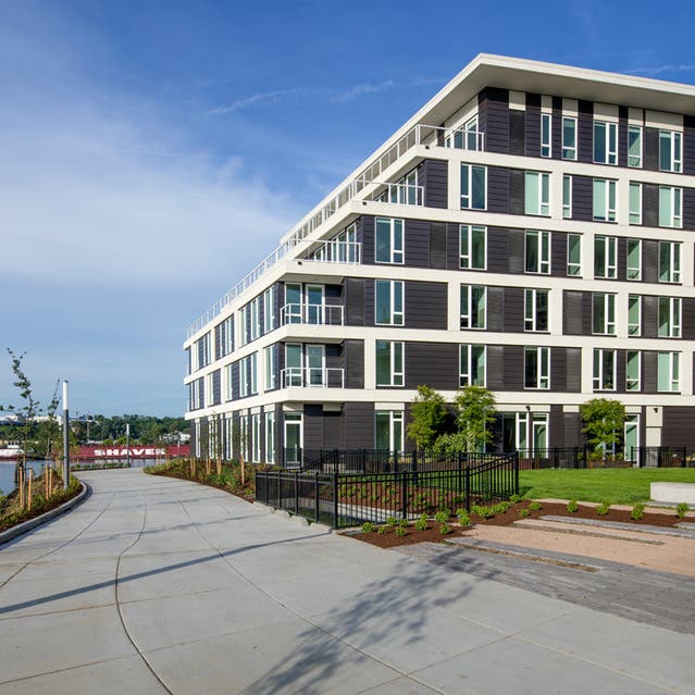 Rivage Apartments - Rivage Apartments Building Exterior with Access to Waterfront Greenway