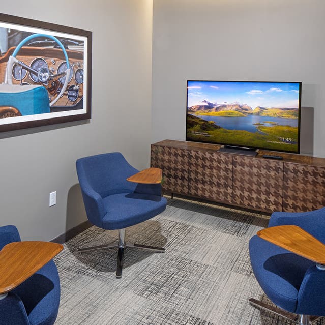Rivage Apartments - Private Conference Rooms with Chairs and TV