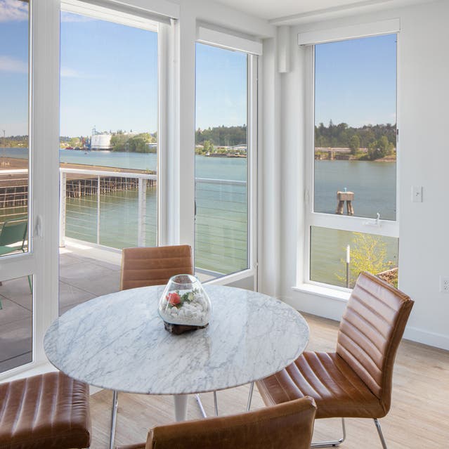 Rivage Apartments - Dining Room Overlooking Private Balcony and Willametter River