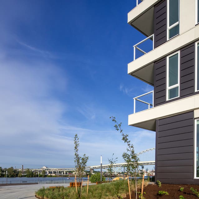 Rivage Apartments - Exterior of Building with Path along Willametter River to Waterfront Greenway