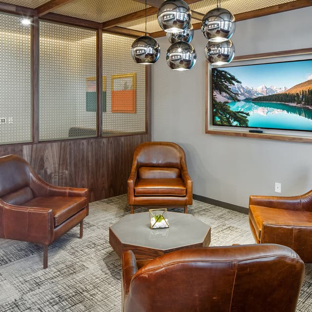 Rivage Apartments - Private Conference Rooms with Chairs and TV