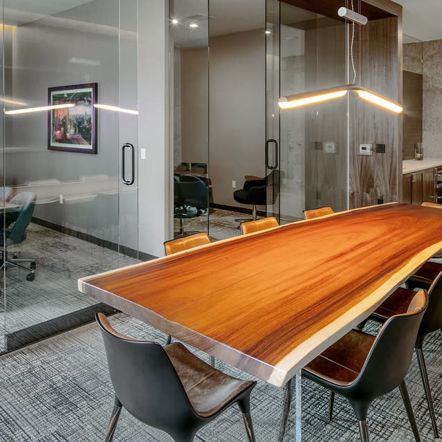 Rivage Apartments - Conference Room with Large Meeting Table and Smaller Private Conference Rooms
